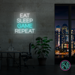 LED neonskilt med rektangulær ramme og tekst «EAT SLEEP GAME REPEAT» i lyseblått lys