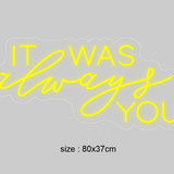 LED-neonskilt «IT WAS always YOU», gul lys og størrelse 80×37 cm.