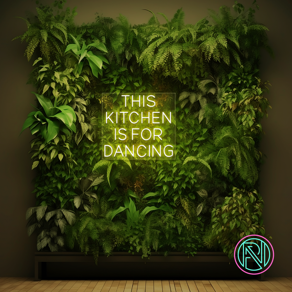LED-neonskilt med tekst "THIS KITCHEN IS FOR DANCING" i grønt lys