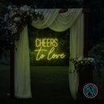 LED-neonskilt med «CHEERS to love», lysende sitrongul