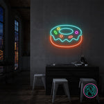 LED-neonskilt i donut-form med flerfargede lyslinjer