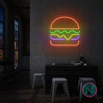 LED-neonskilt med hamburgerform, oransje øvre del og regnbuelinjer under