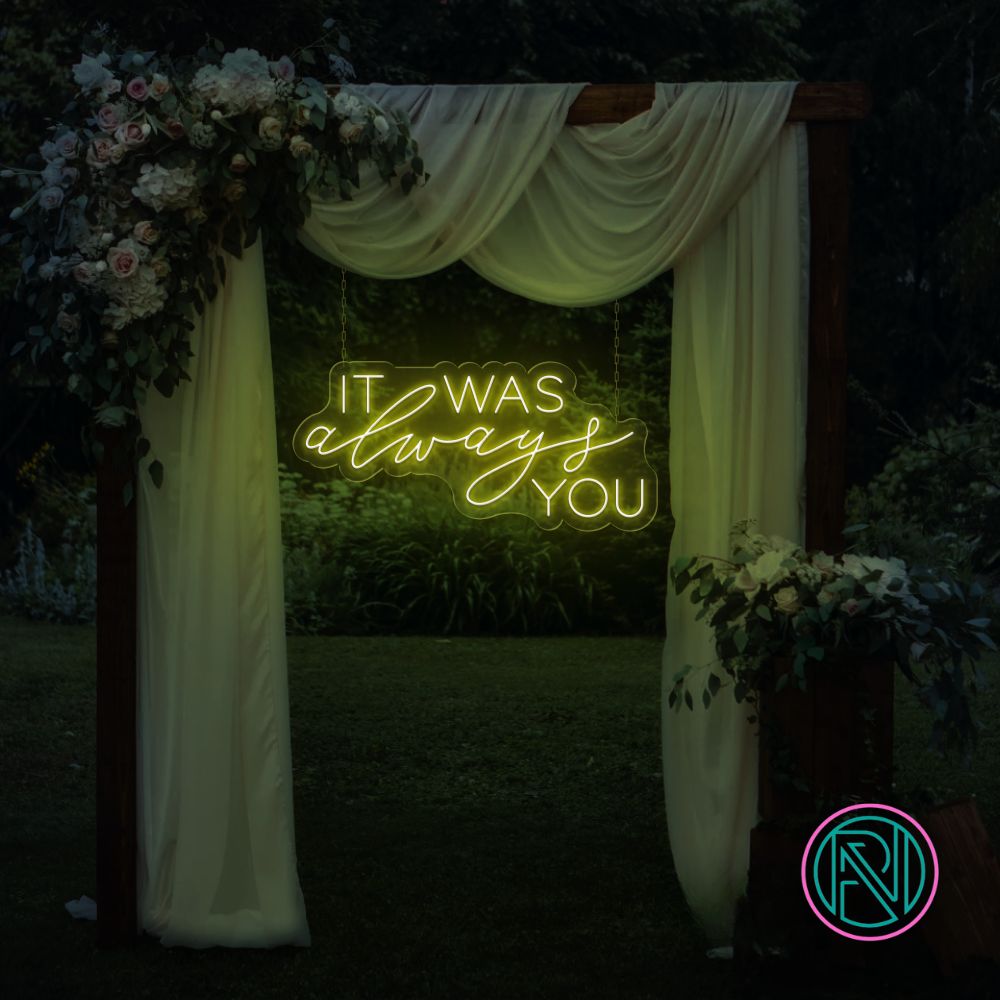 LED-neonskilt med tekst «IT WAS always YOU», gulgrønn glød