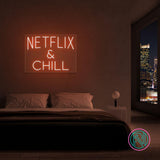 LED neonskilt NETFLIX & CHILL med oransje neonlys.