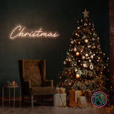 LED-neonskilt med «Christmas» i varmhvitt lys.