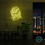 LED-neonskilt med Einsteins portrett, veggmontert, med gult lys