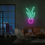 LED-neonskilt med potteplante, grønt og rosa lys