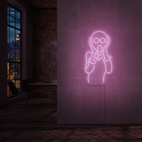 LED-neonskilt med kontur av skrikende figur, lysende rosa/lilla