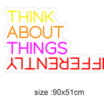 LED neonskilt med tekst «THINK ABOUT THINGS» i neonfarger, størrelse 90x51 cm.