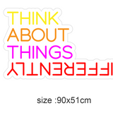 LED neonskilt med tekst «THINK ABOUT THINGS» i neonfarger, størrelse 90x51 cm.