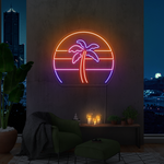 Lite LED-neonskilt: rund tropisk palme i rosa, lilla og oransje lys.